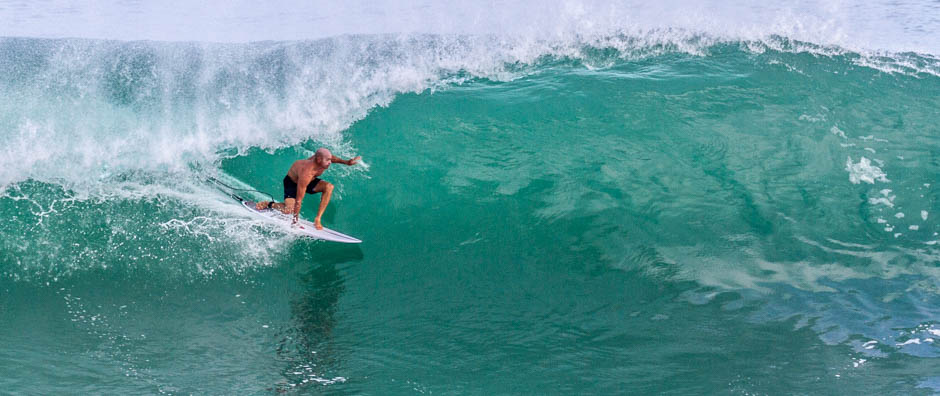 Kelly Slater in the barrel at Padang Lefts