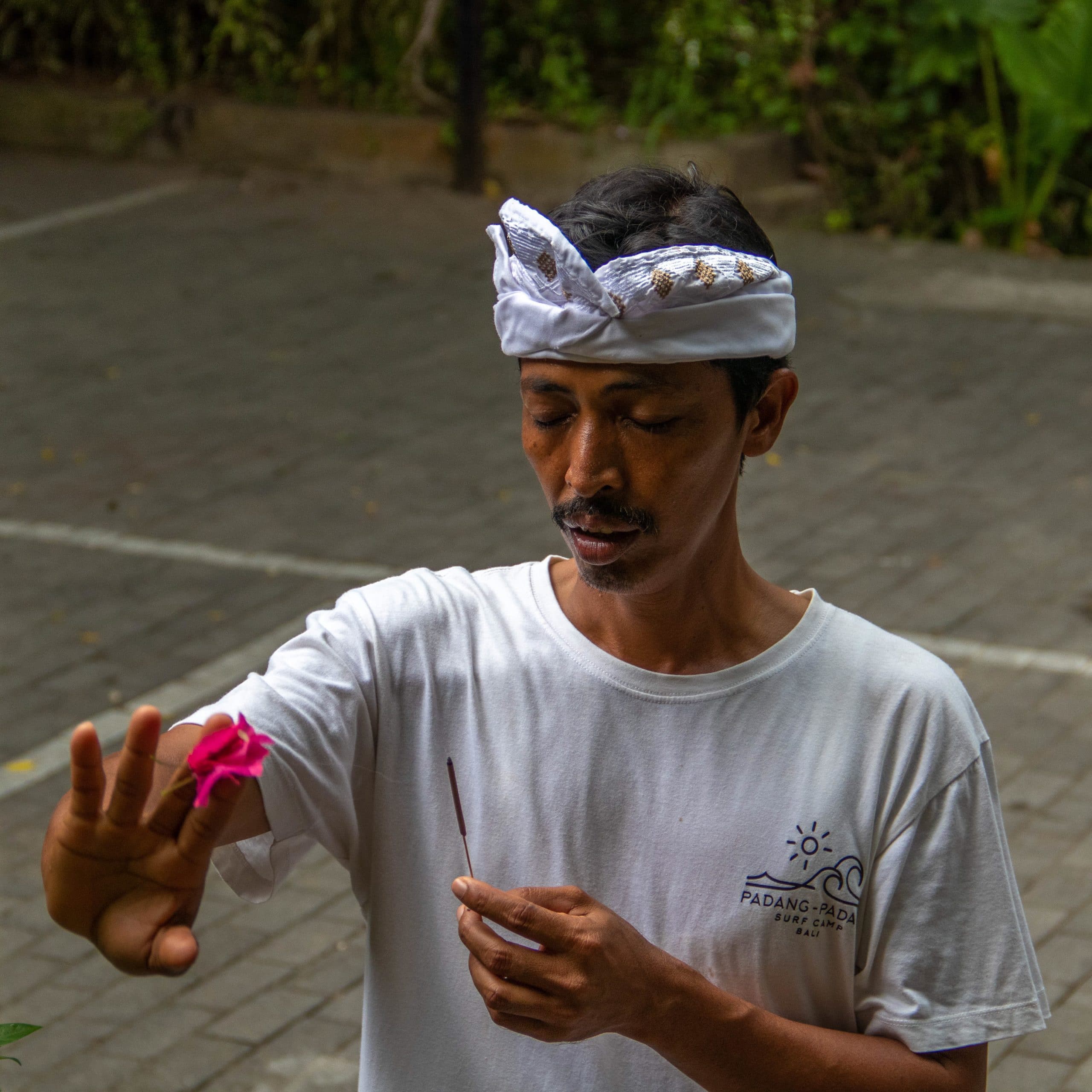 Pak Nyoman praying.