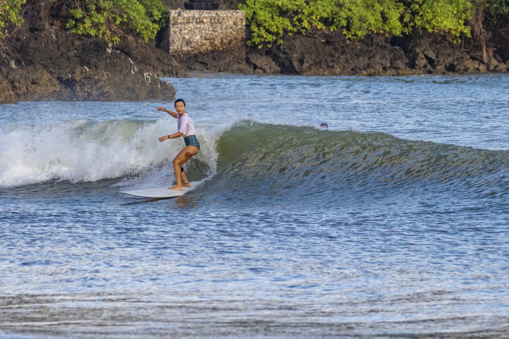 Longboarder at Muaya Beach, Jimbaran